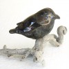 Zwart vogeltje op tak - 2010 * Keramiek - 5 cm hoog